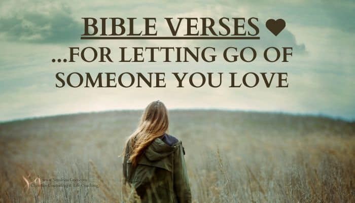 woman looking at field; title- 67 bible verses about letting go of someone you love