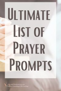 praying hands on bible; title- ultimate list of prayer prompts