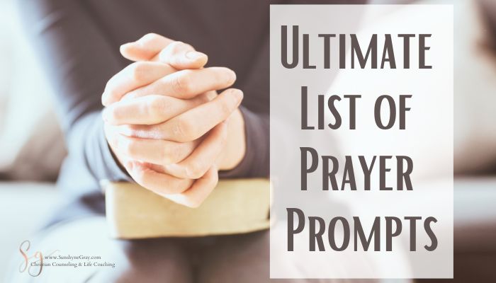 praying hands on bible; title- ultimate list of prayer prompts